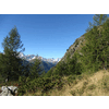 Laatste blik op de besneeuwde bergen rond de Clarahütte voordat ze achter de rand verdwijnen