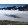 De Essener- und Rostocker Hütte precies door een gat in de wolken te zien